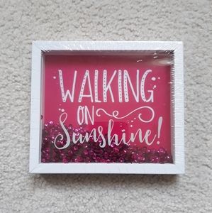 “Walking on Sunshine" Sign